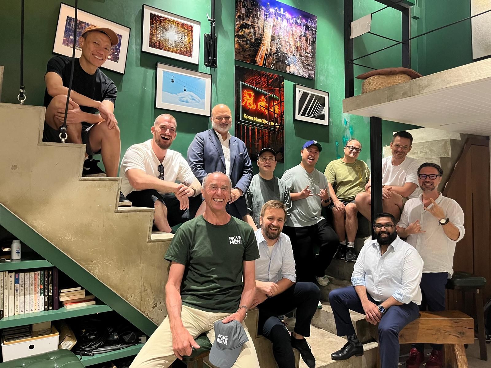 The MoveMEN! group gathered on a Hong Kong staircase